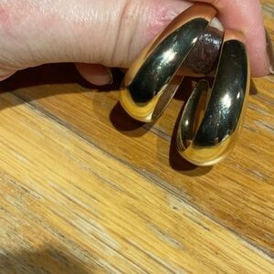 Gold three quarter hoop earrings